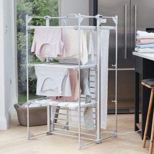 Heated clothes airer dryng clothes and towels