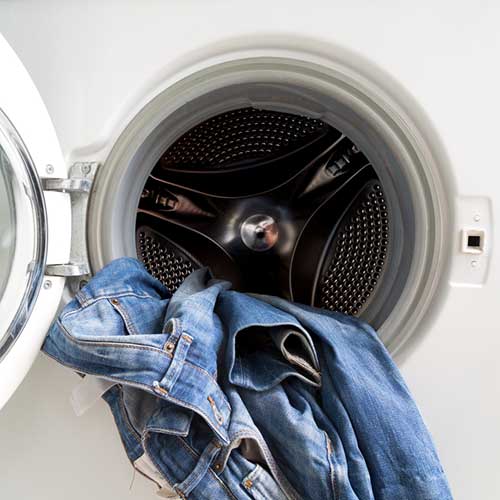 Jeans going into tumble dryer