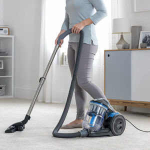 Cheap and budget vacuum cleaner being used