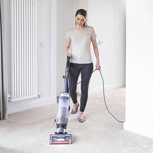  Woman using the best vacuumcleaner
