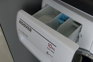 A Hoover Washing Machine With the Soap Drawer Open
